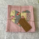 Set of 6 Rose and Hubble Appliqué Heart Coasters.