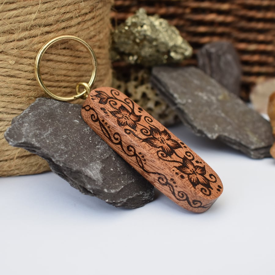 Floral pyrography keyring on mahogany. Ideal wood gift, ready to post.
