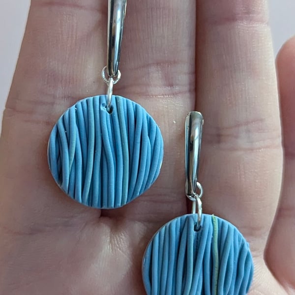 Sprinkles button drop earrings in blue. 