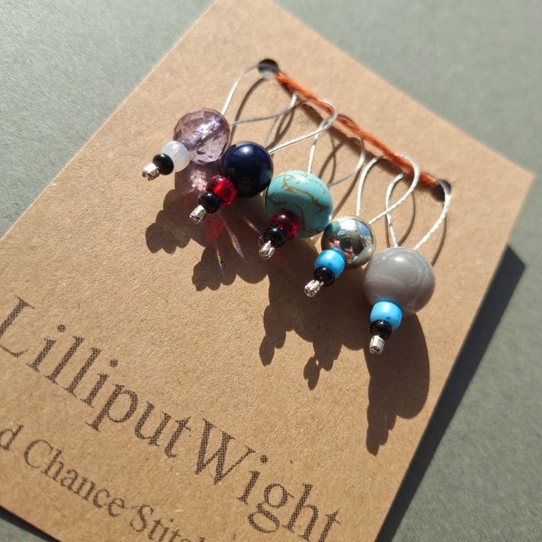 Five recycled jewellery stitch markers
