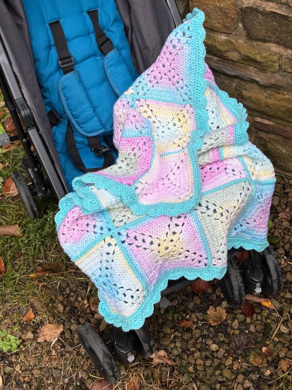 Bright and colourful cot or buggy blanket