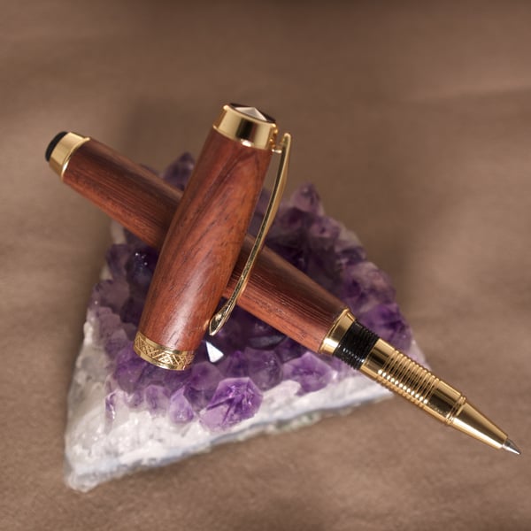 Padauk wood rollerball pen hand crafted by the sea on Orkney, R7,2