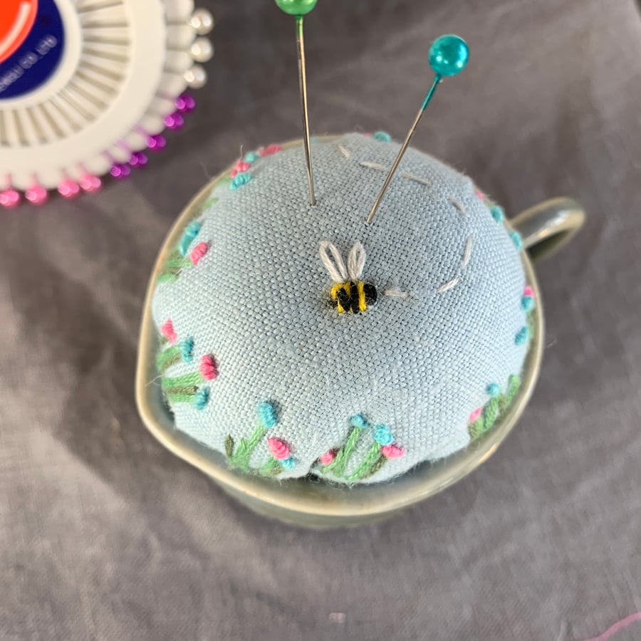 Vintage jug embroidered pincushion