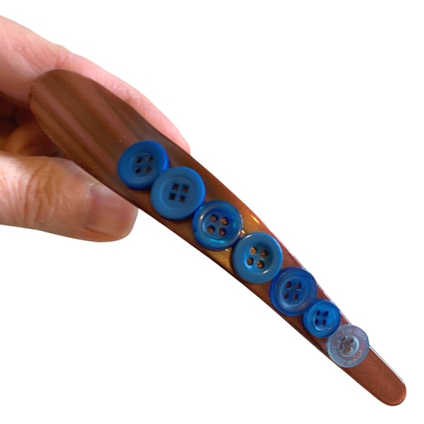 Brown Banana Hair Clip modified with Blue Buttons