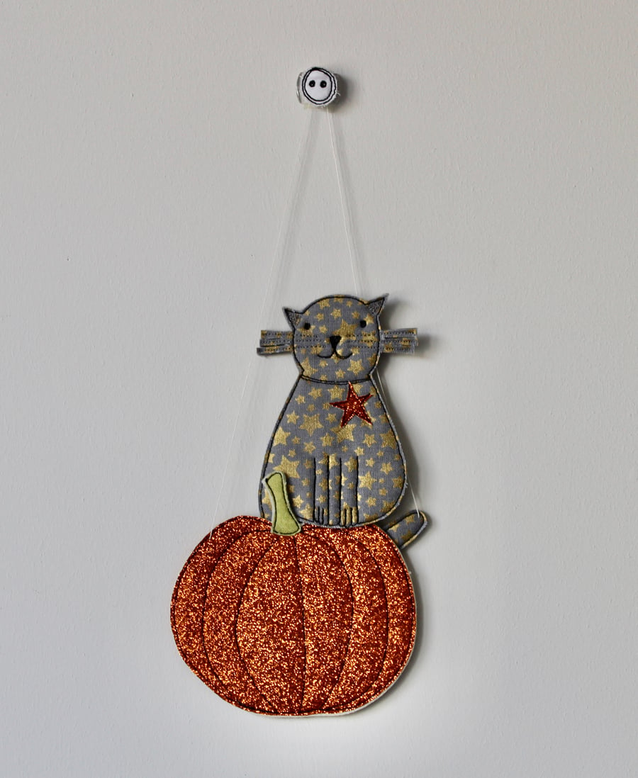 'Cat Sitting on a Glittery Pumpkin' - Hanging Decoration
