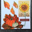 Sunflower, pumpkin and leaves autumn greetings card