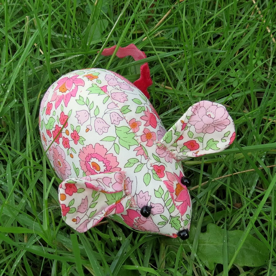 A liberty lawn pin cushion.  Field mouse.