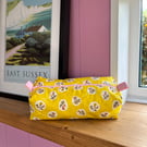 Handmade quilted floral make up bag with polka dot lining 