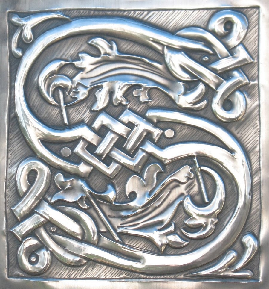 Letter S handcrafted in pewter monogram.