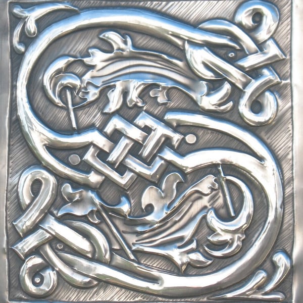 Letter S handcrafted in pewter monogram.