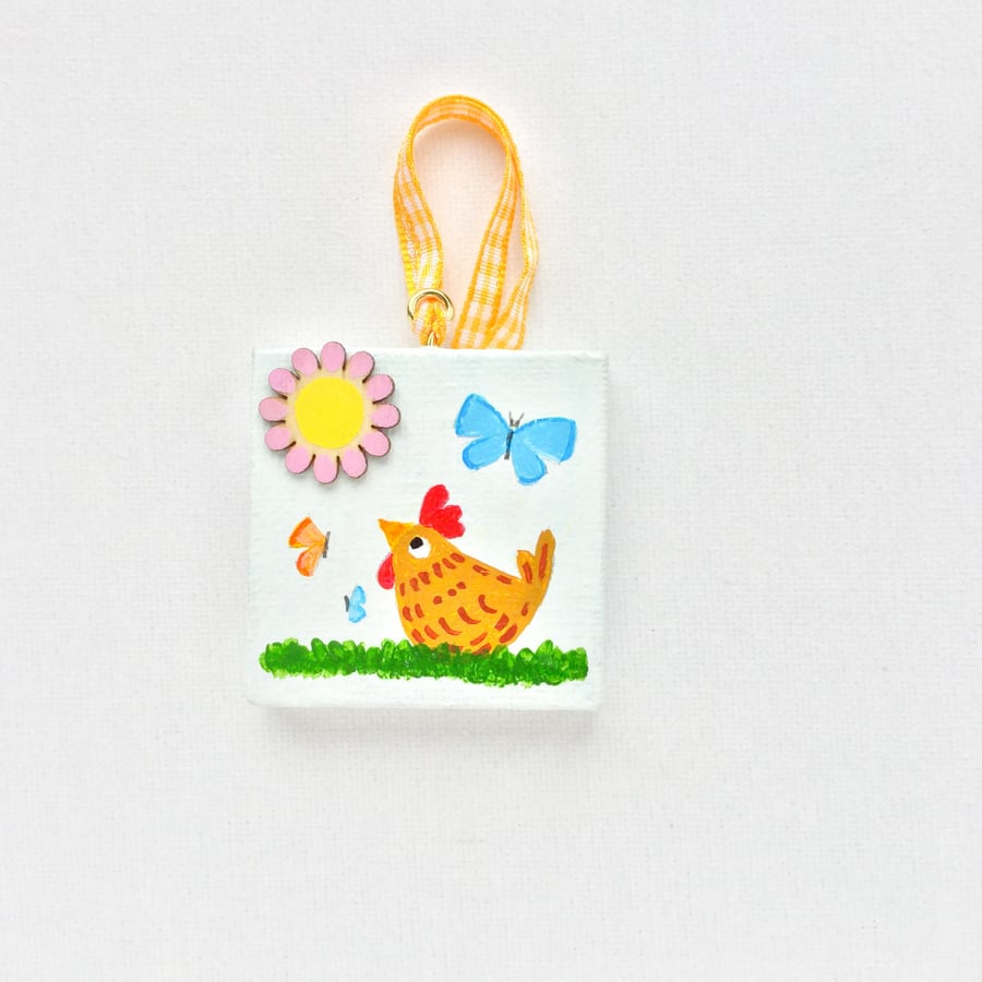 Hand painted miniature canvas Cheeky chicken.