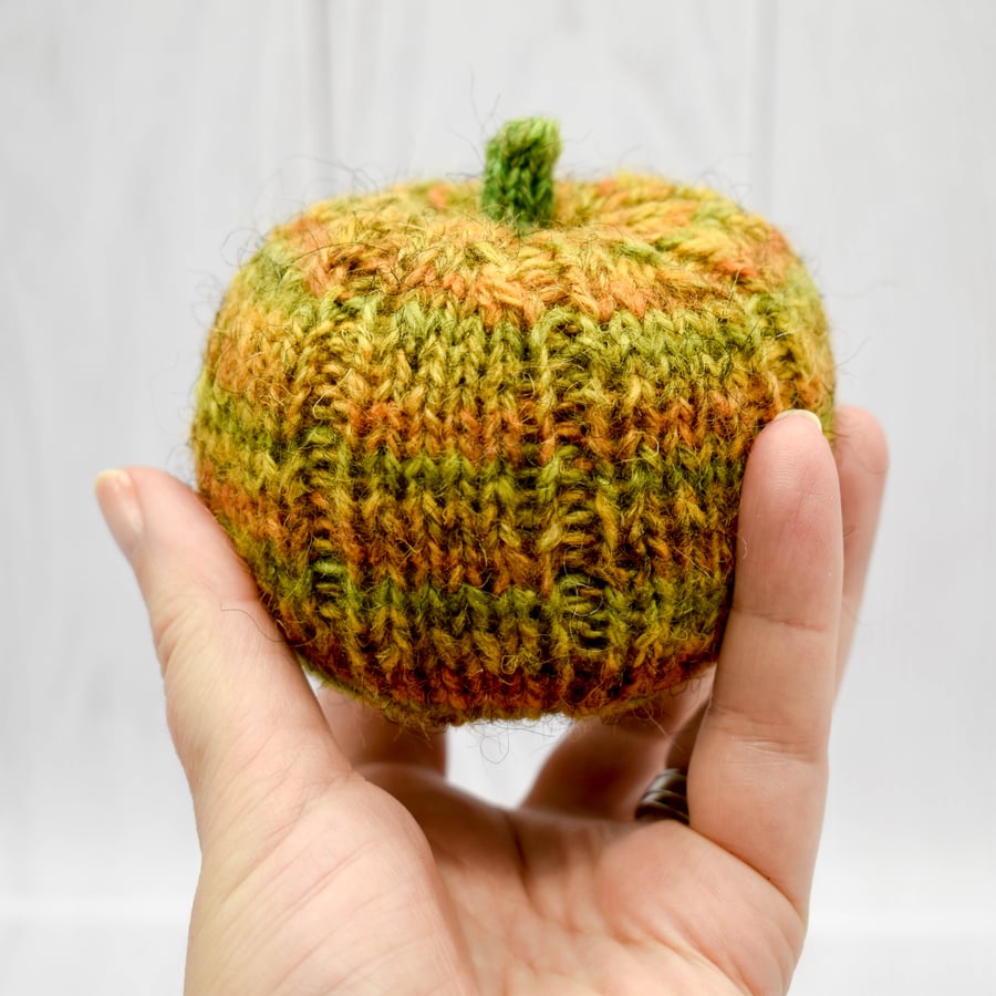 Hand knitted pumpkin pin cushion green and orange