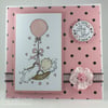 Handmade new baby girl card, baby in basket
