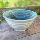 Hand-thrown stoneware bowl in teal glaze
