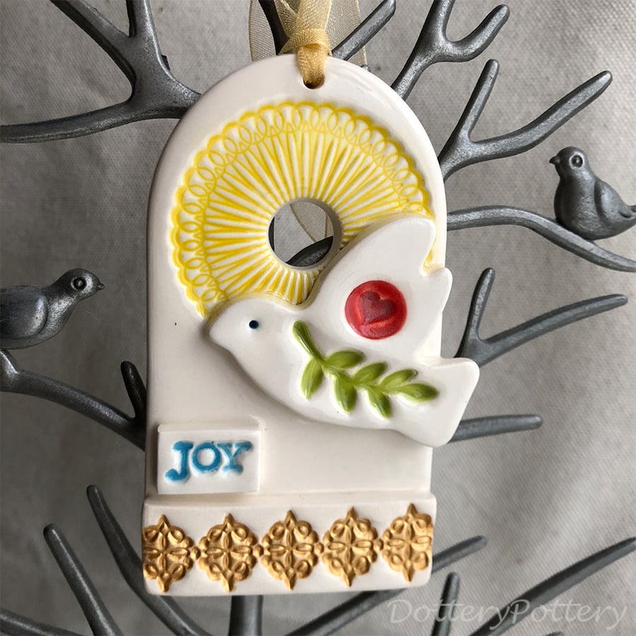 Large ceramic christmas decoration with dove of Joy