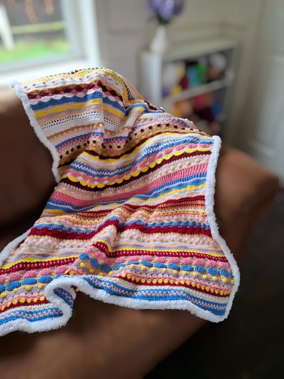Blanket of Many Colours with White Fluffy Border
