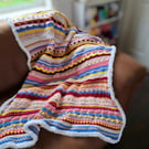 Blanket of Many Colours with White Fluffy Border