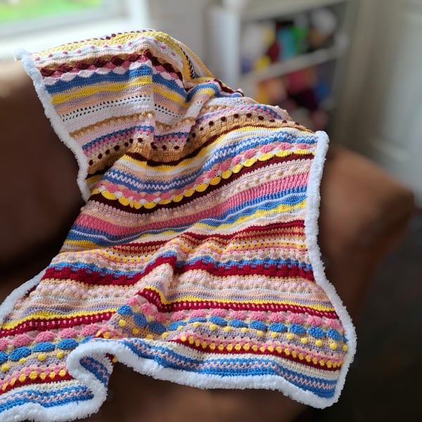 Blanket of Many Colours with White Fluffy Border