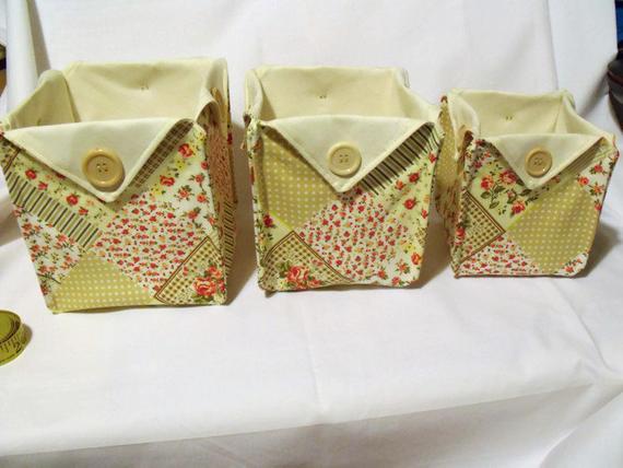 set of three graduated folded fabric storage tubs for your nik naks, beige 