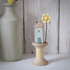 Wooden House on a Vintage Floral Bobbin with Clay Flower