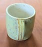 Stoneware pottery mug finished in a melon green glaze - Image 4
