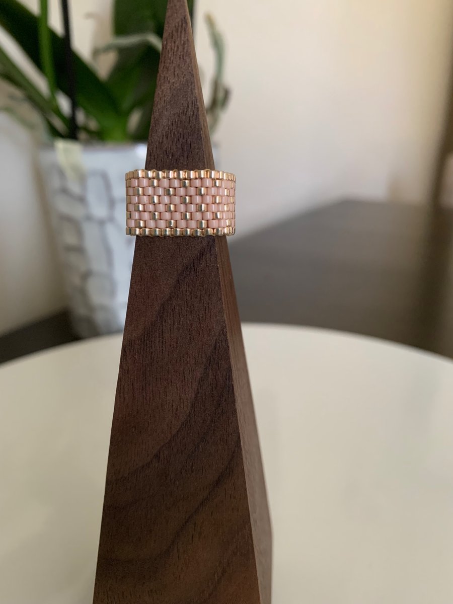 Light coloured beaded ring