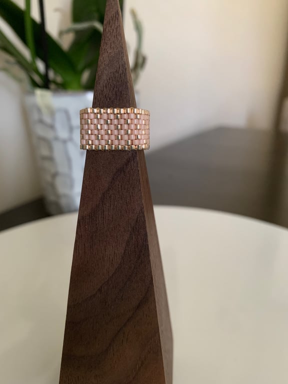 Light coloured beaded ring