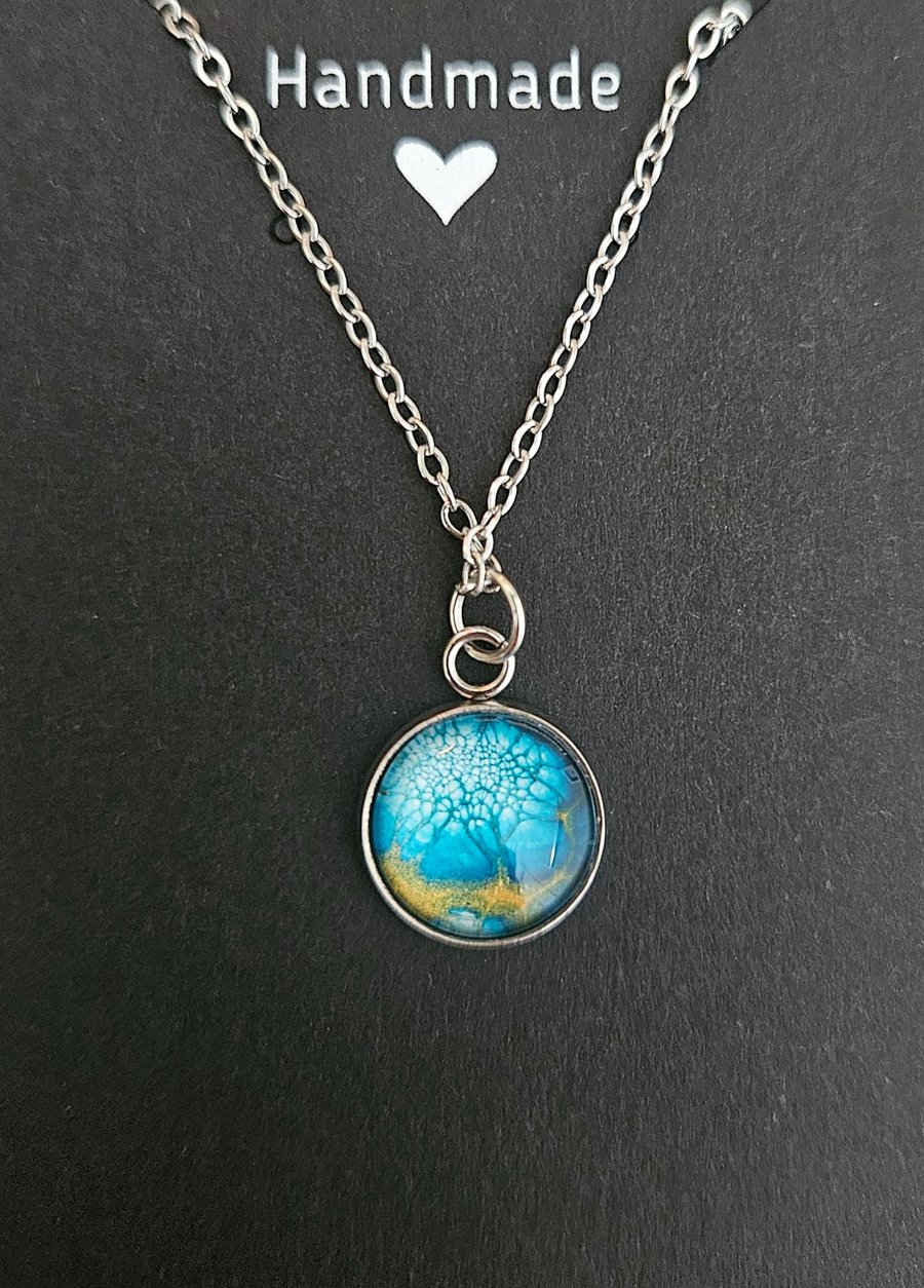 Blue paint pour necklace