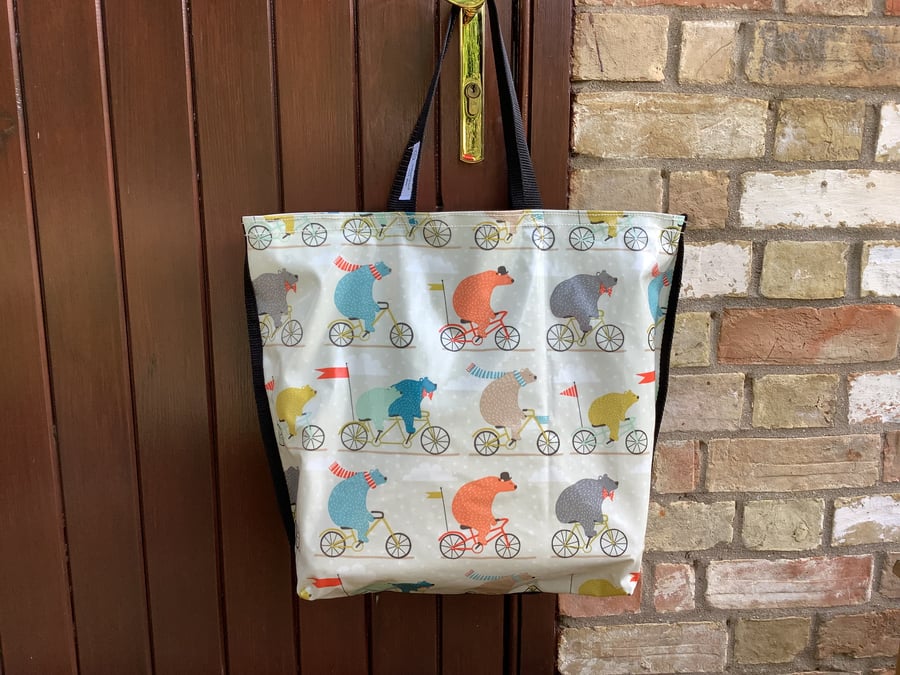 Waterproof tote featuring quirky bears on bikes. Pretty and tough too.