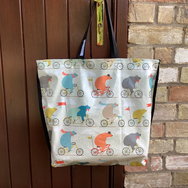 Waterproof tote featuring quirky bears on bikes. Pretty and tough too.