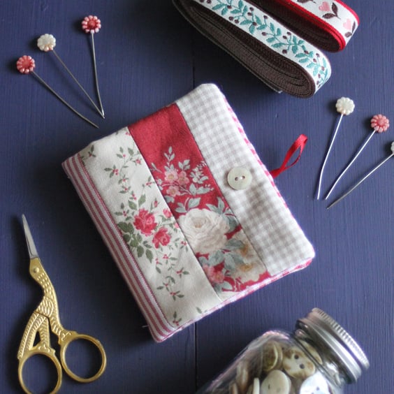 Patchwork stripe needle case made from Tilda fabric in shades of red and natural