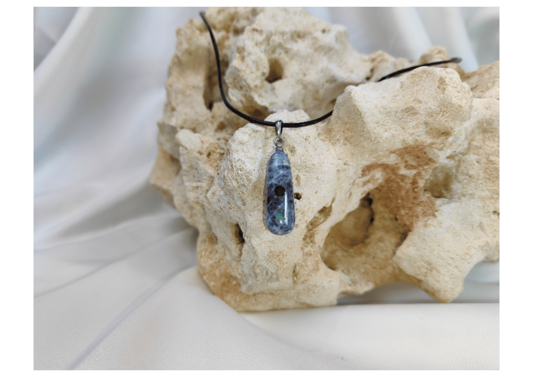 Kyanite pendant with Garnet and Emerald