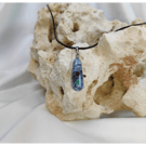 Kyanite pendant with Garnet and Emerald