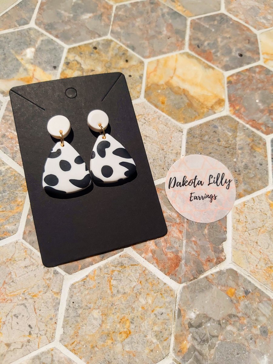 White stud with cow print triangle drop polymer clay earrings