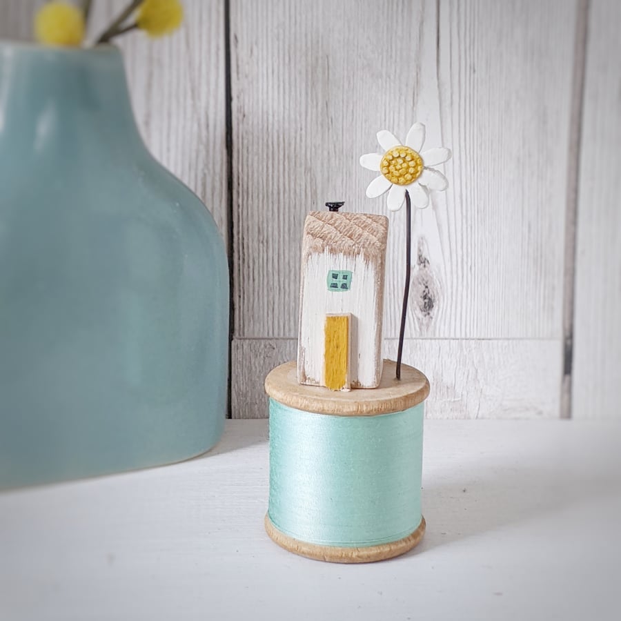 Wooden House on a Vintage Bobbin with a Clay Daisy