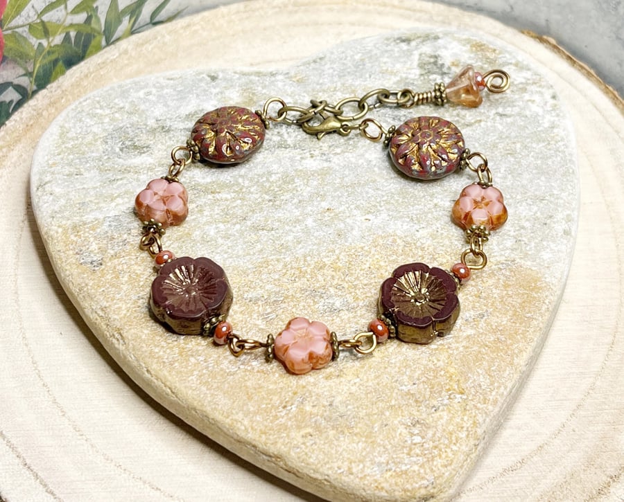 Floral boho flower bracelet in deep red and pink colours