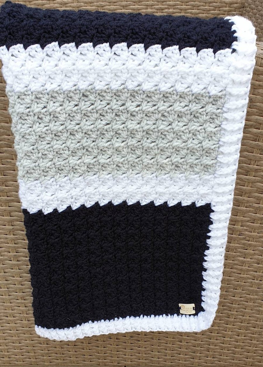 Oxford Blue, pale grey and white striped crocheted baby blanket