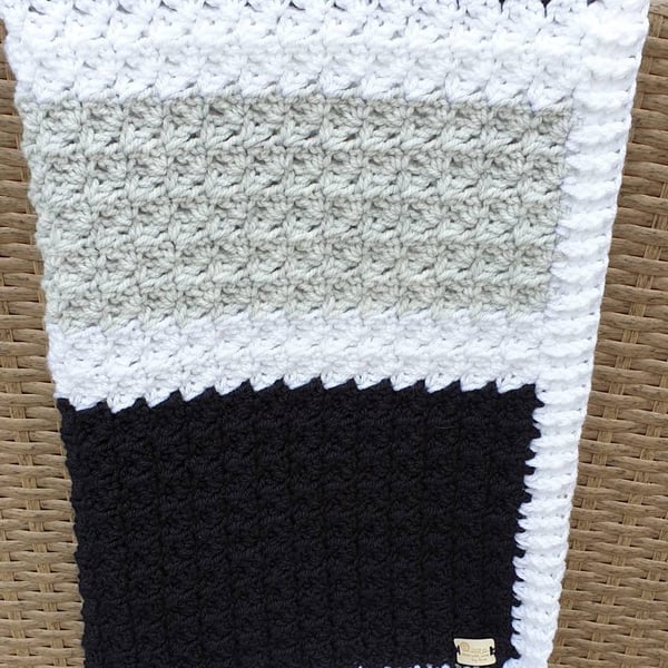 Oxford Blue, pale grey and white striped crocheted baby blanket