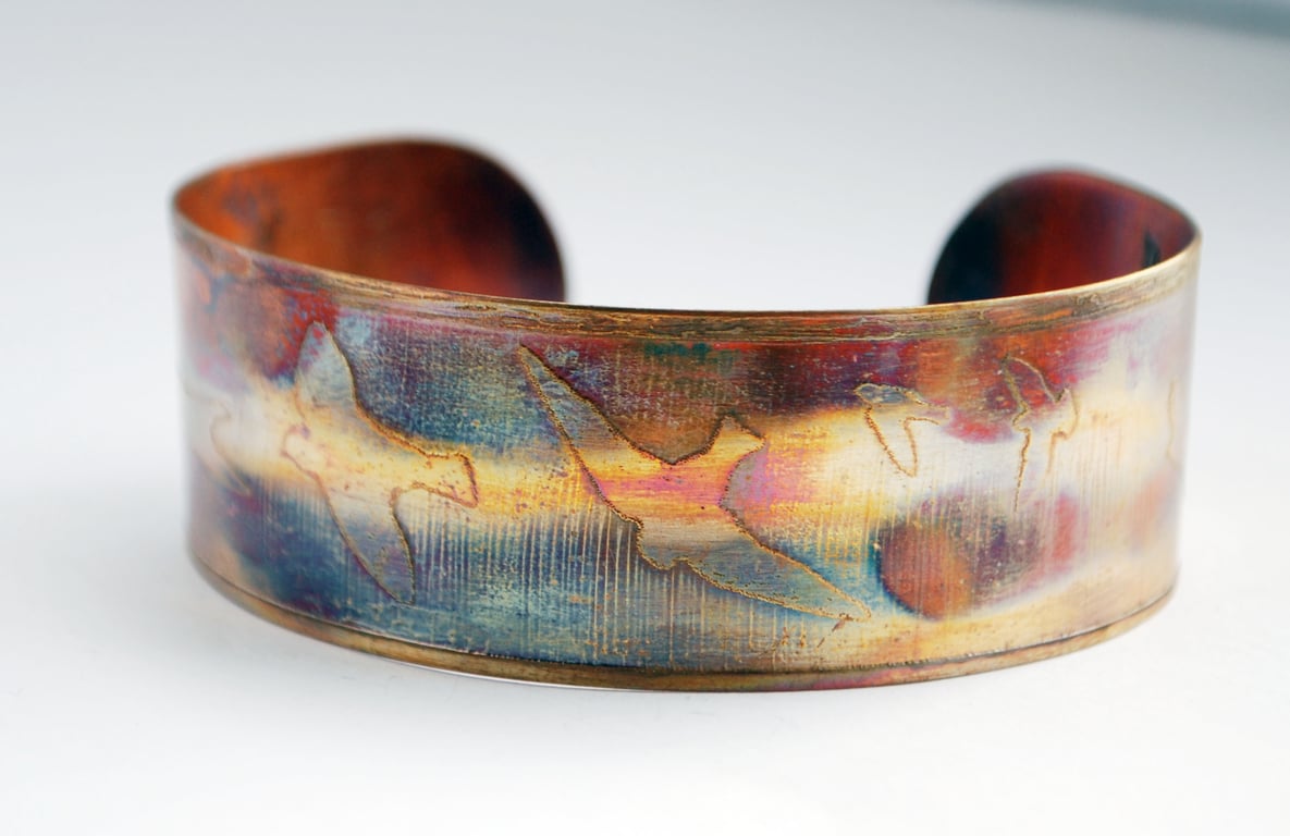 Medium copper bird on wing cuff for birdwatchers