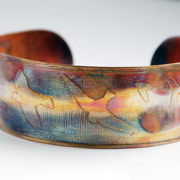 Medium copper bird on wing cuff for birdwatchers