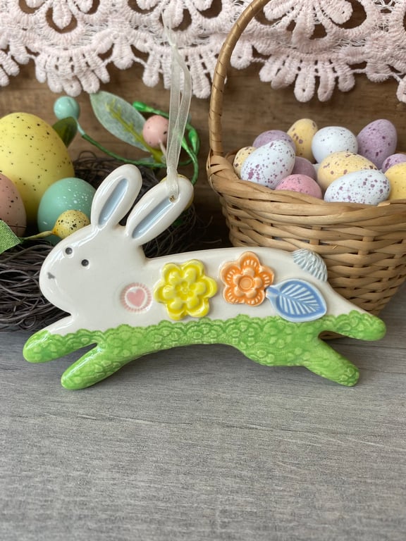 Ceramic Leaping Bunny decoration with flowers green