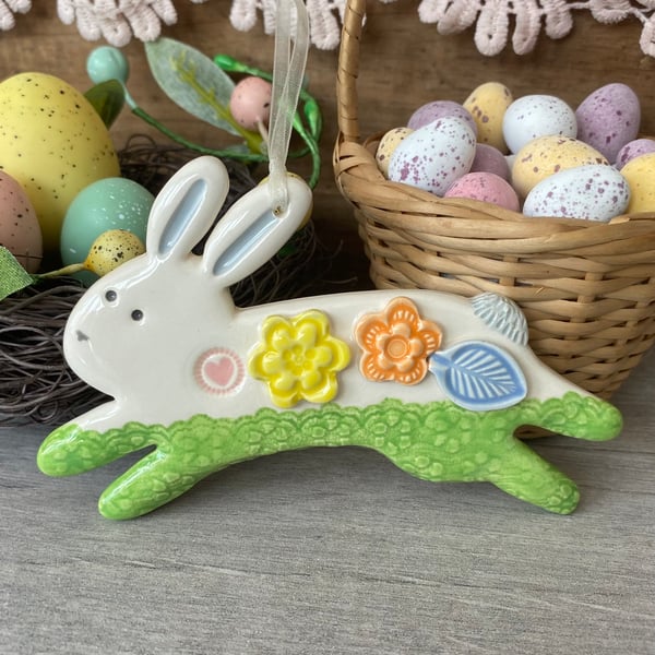 Ceramic Leaping Bunny decoration with flowers green