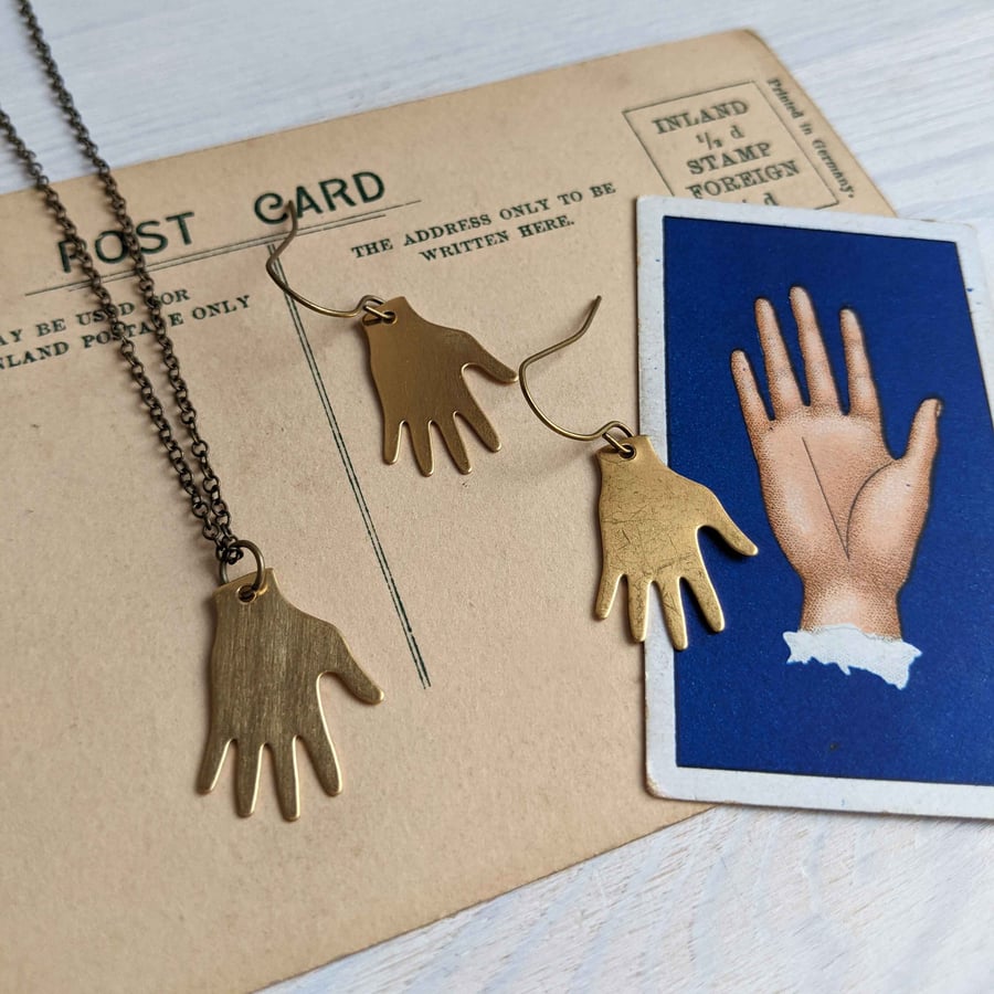 Hand necklace - golden brass hand pendant - modern jewellery - nickel free