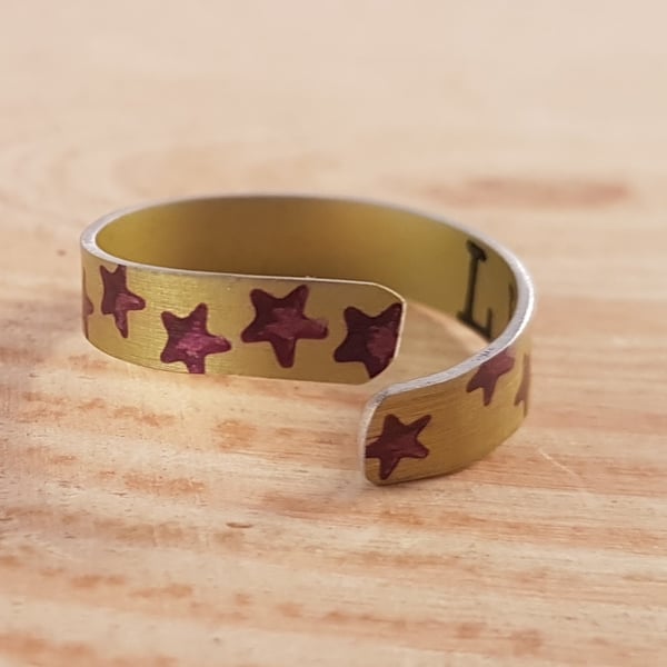 Anodised Aluminium Yellow and Purple Star Cross Over Adjustable Ring AAR041804