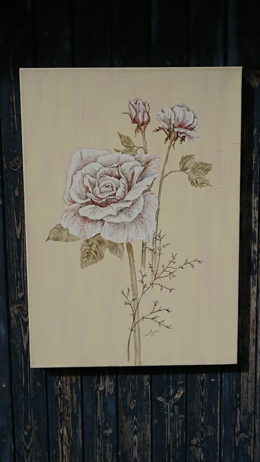 Pink and white painting of roses on canvas with pink and cream background
