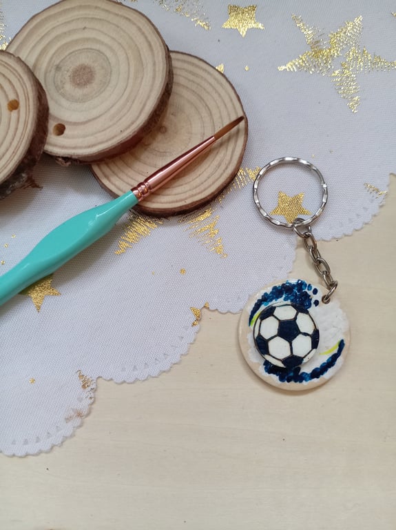 Wooden circular dark blue football keyring 
