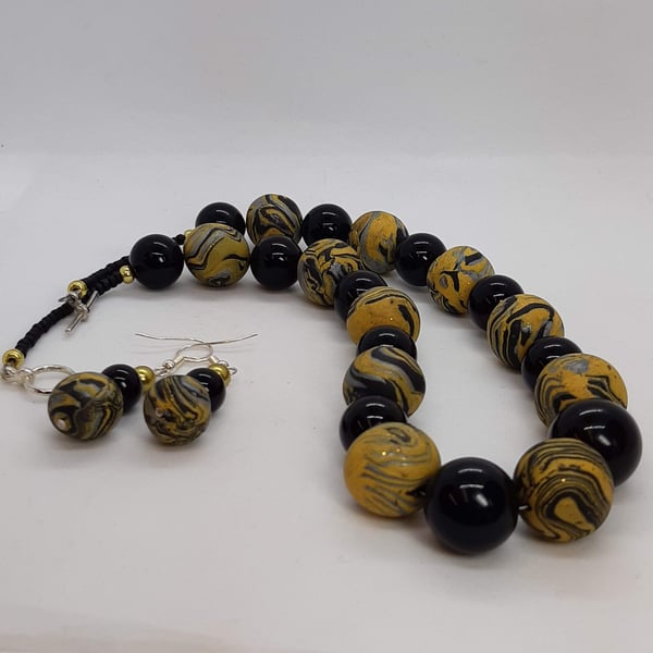 Black and mustard necklace and earrings set