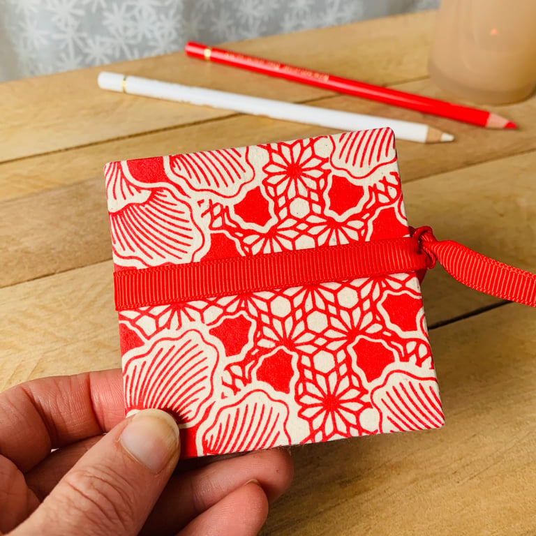 Miniature Concertina sketchbook with Lokta Paper Covers and Ribbon Tie.