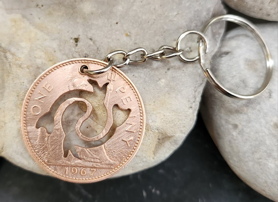 Pisces symbol cut from penny coin as bag charm or keyring