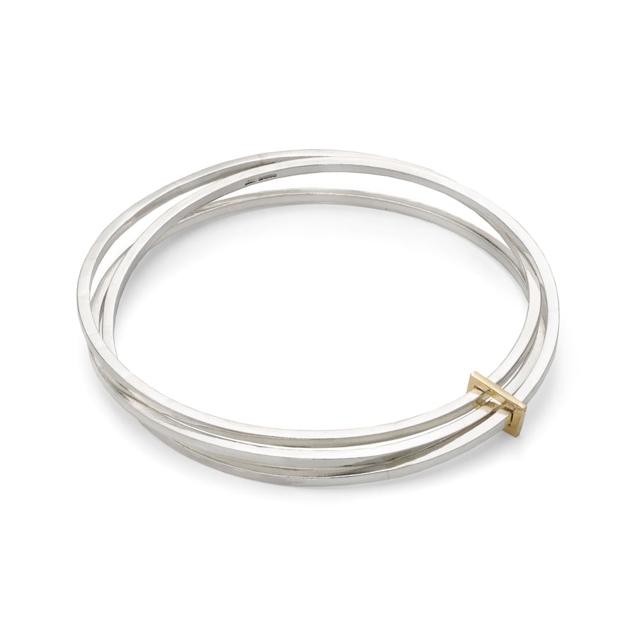 Clara by Fedha - stylish set of three silver bangles with solid gold link